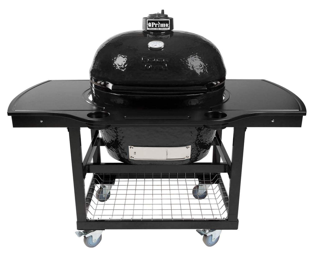 Charcoal oval ceramic kamado grill on wheeled cart with wire rack and shelves