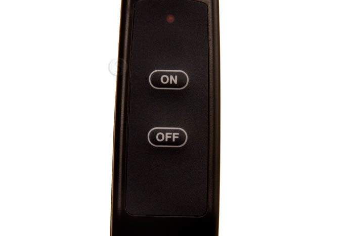 Dark remote transmitter close-up with ON and OFF buttons