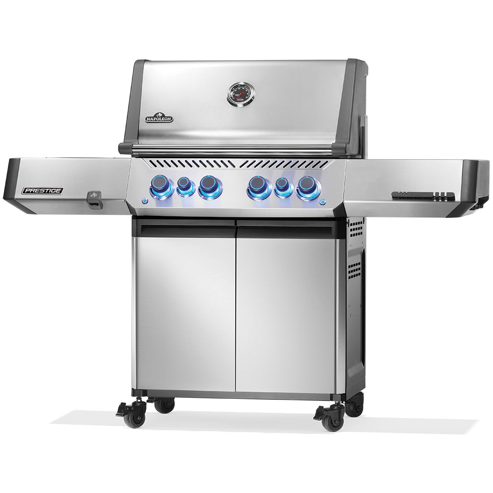 Stainless steel gas grill on wheeled cart with burner control panel and side shelf