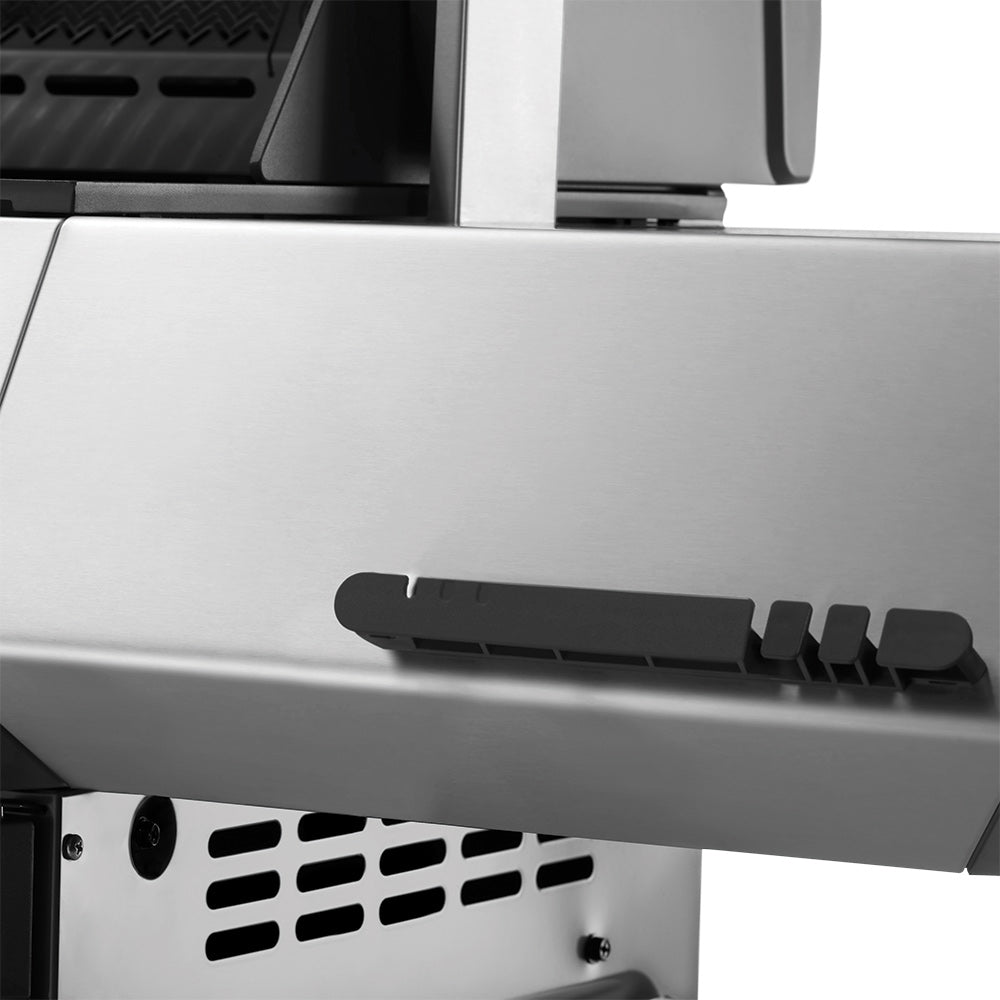 Gas grill side panel and burner area with vent slots under the front control box