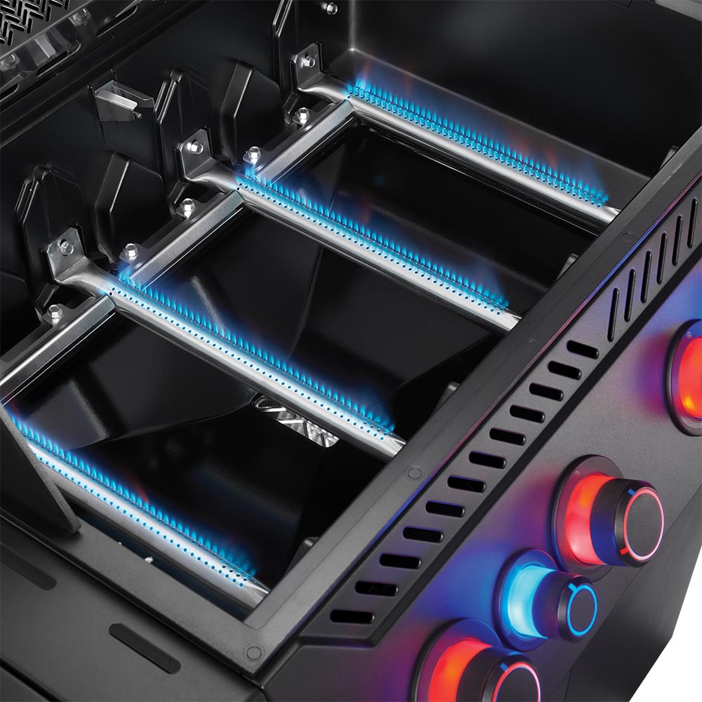Infrared gas burner inside grill with blue glowing heating elements