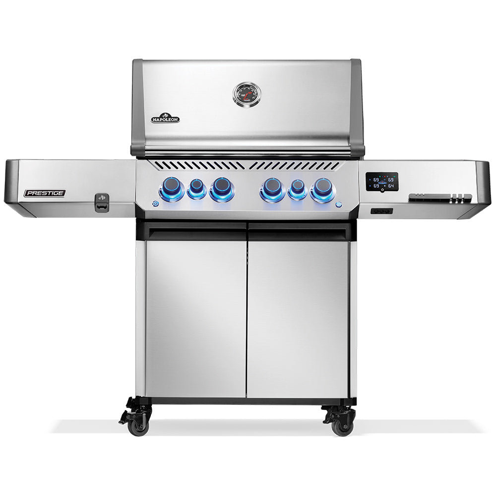 Stainless gas grill on cart with blue control knobs and lid-mounted thermometer