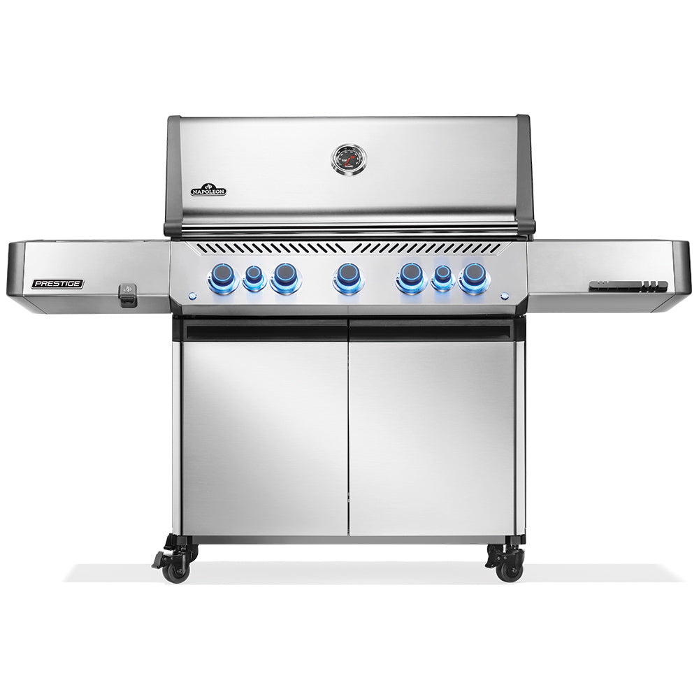 Stainless steel gas grill with control knobs and two-door cabinet on wheels