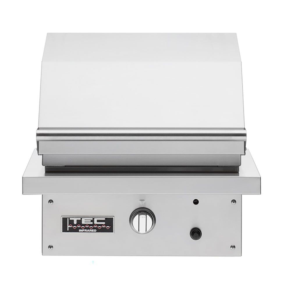 Infrared built-in gas grill with stainless front panel and control knobs, lid closed