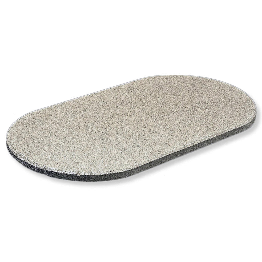 Oval baking stone with speckled light gray surface