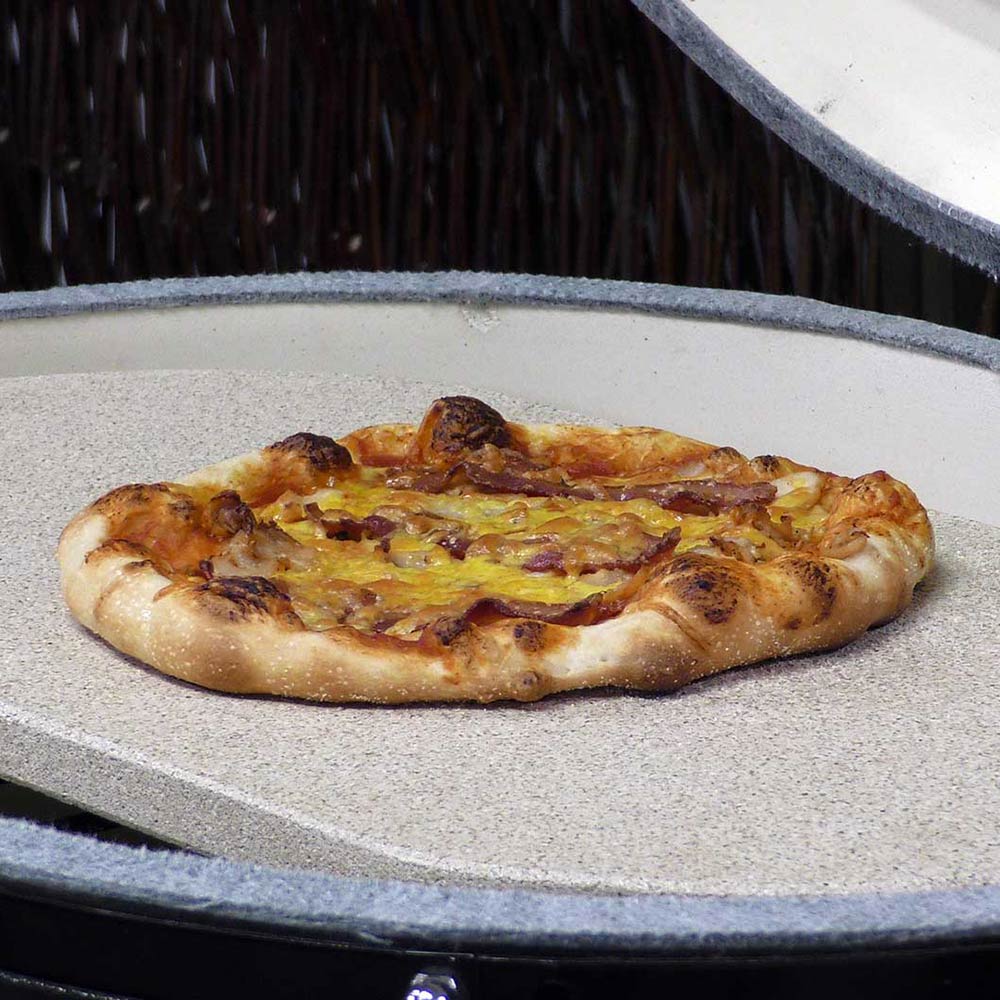 Oval baking stone topped with small pizza