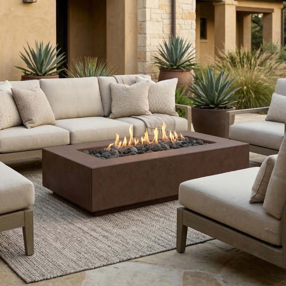 Dark brown concrete gas fire pit with square frame and visible flames