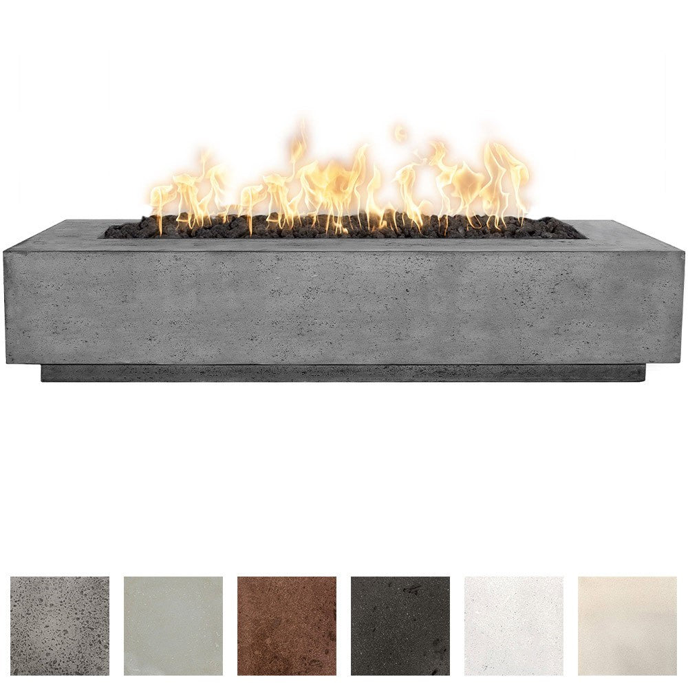 Rectangular concrete gas fire pit in dark gray with visible flames on black rocks