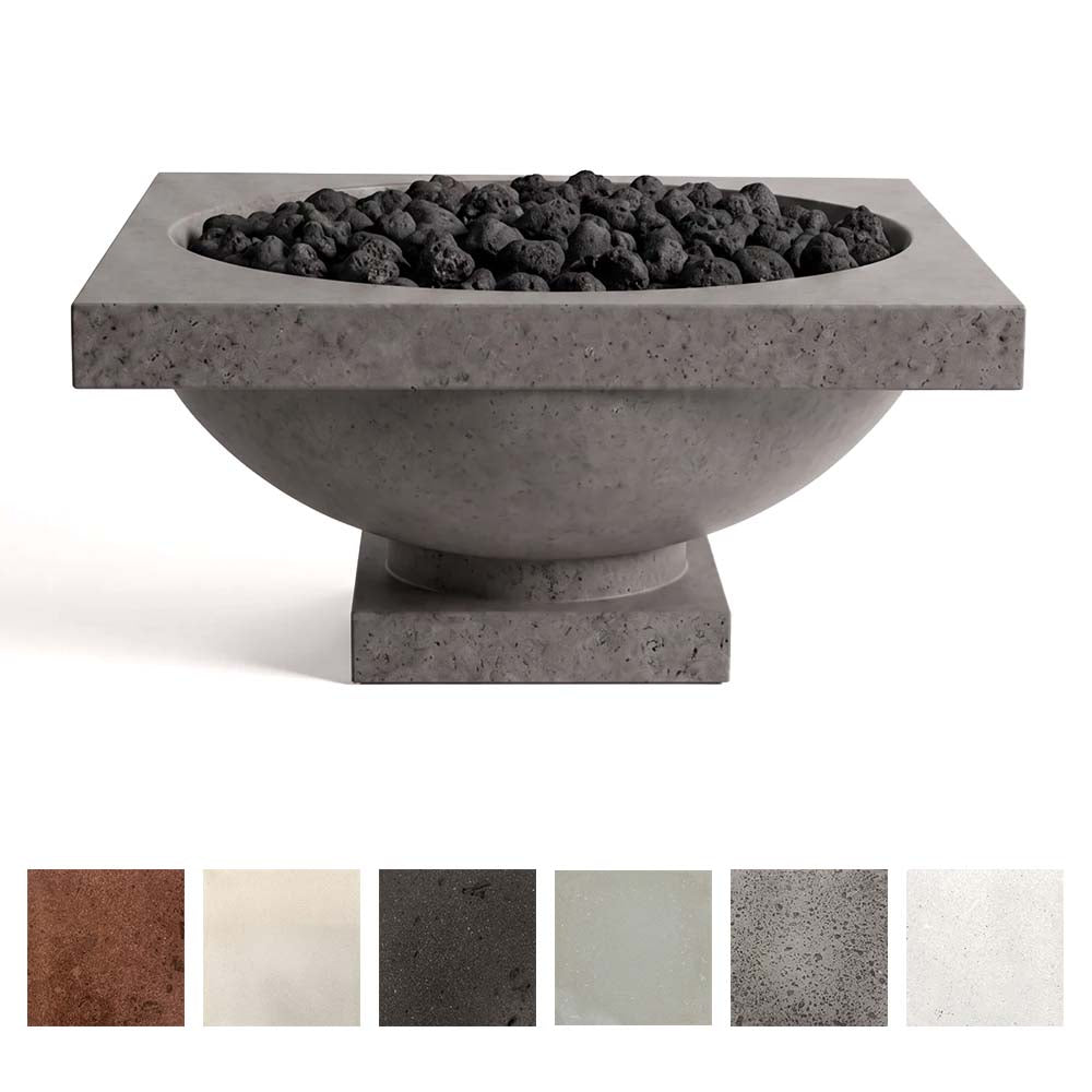 Speckled gray concrete gas fire bowl filled with black lava rocks, front view