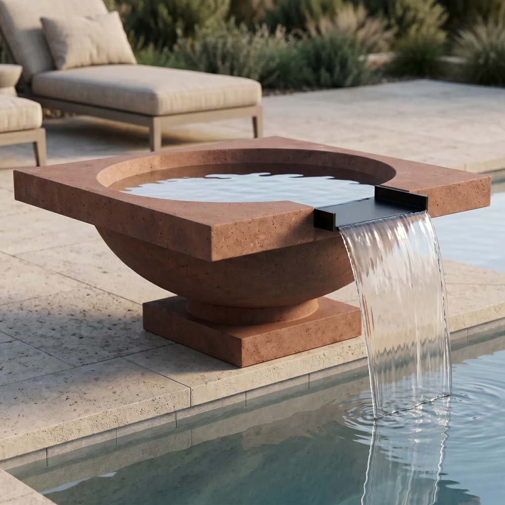 Cafe concrete gas fire and water bowl with water spill over rim.
