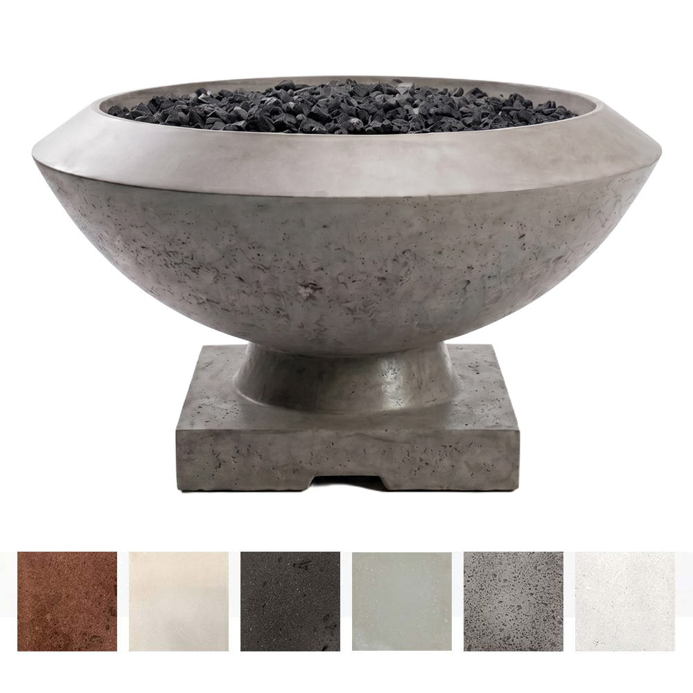 Concrete gas fire bowl in gray concrete finish with lava rock in open top