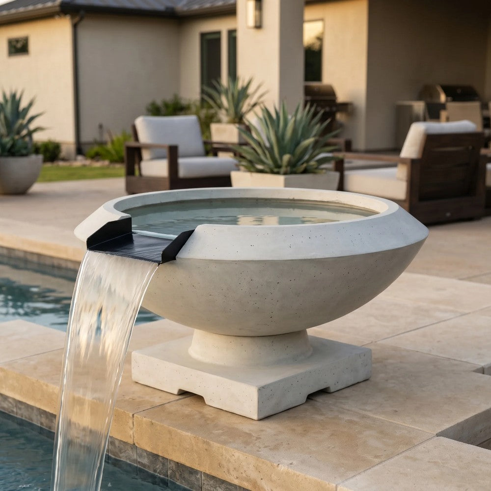 Prism Hardscapes Toscano concrete gas fire and water bowl with water pouring over rim