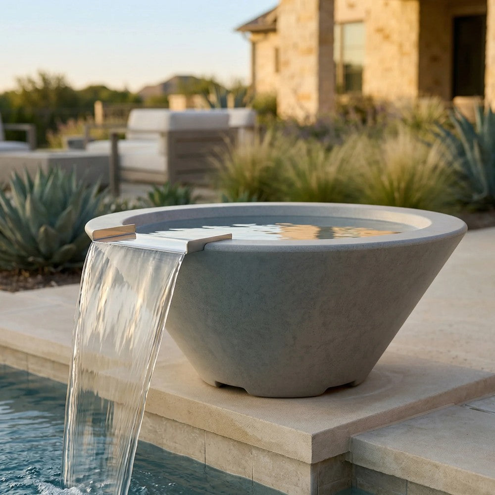 Concrete fire and water bowl with gray finish and sheet-style water flow over edge