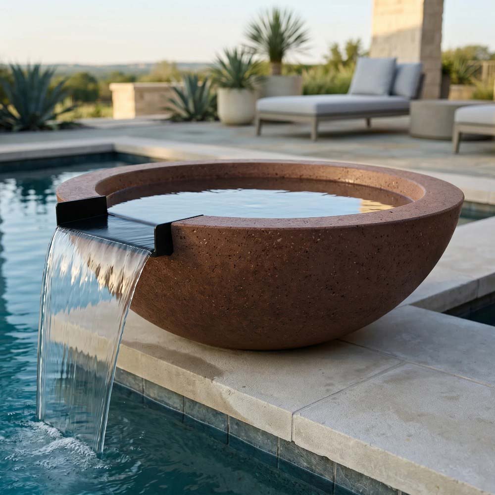 Brown round concrete gas and water bowl with water spout pouring into basin