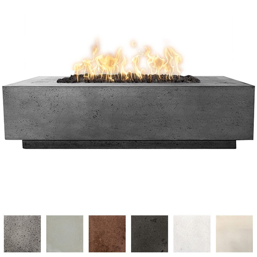 Gray concrete gas fire pit with flames burning in the center firebox.