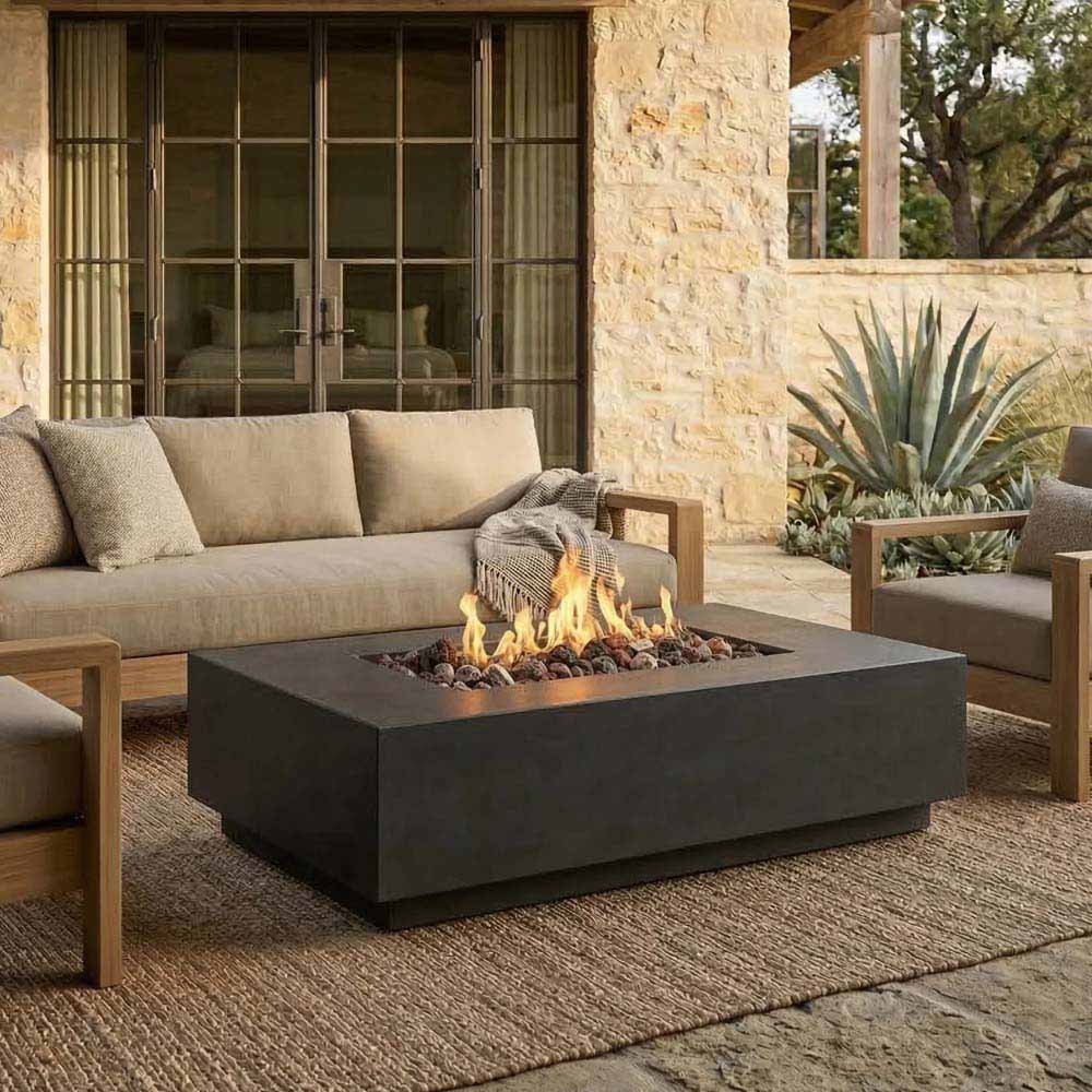 Rectangular concrete gas fire pit with visible flames and dark gray burner base.