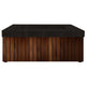 Black gas fire pit with dark concrete top, wooden slat panels, and rectangular burner opening.