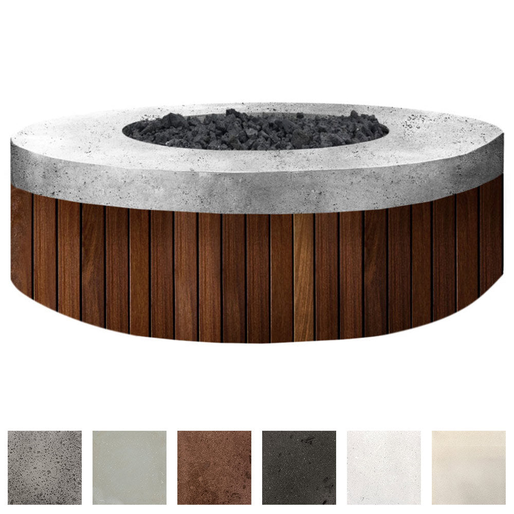Round concrete gas fire pit with speckled gray top, dark lava rock center, wood slat sides