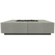 Concrete gas fire pit with rectangular burner opening, square base, light gray-speckled finish.