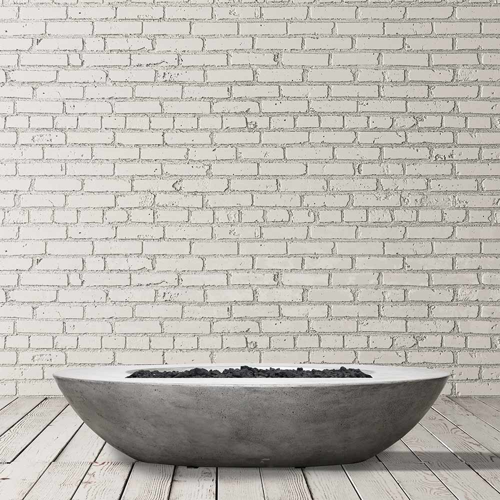 Concrete gas fire pit with oval bowl in gray, top burner cover slot visible