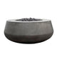 Concrete gas fire bowl in medium gray finish with black lava rocks on the burner