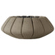Concrete gas fire bowl with ribbed design and dark lava rocks, beige finish.
