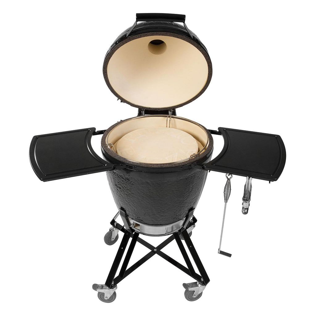 Charcoal ceramic kamado grill with open lid and side shelves