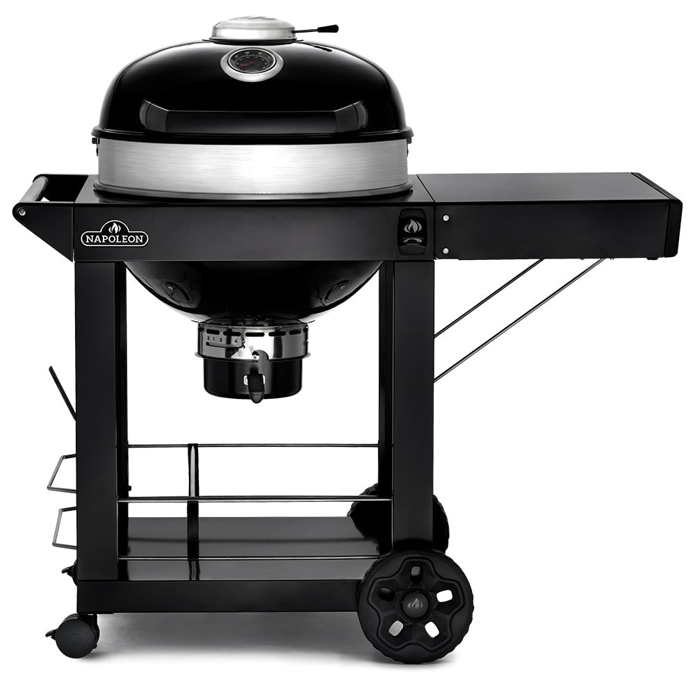 Charcoal kettle grill on cart with black lid and silver firebox, front view
