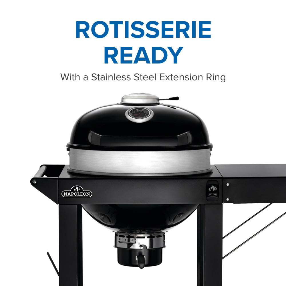 Charcoal kettle grill with lid closed and stainless steel extension ring