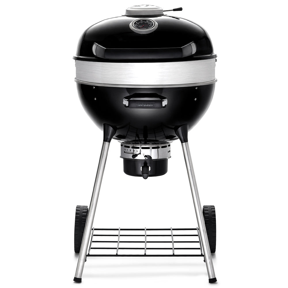 Black charcoal kettle grill with domed lid and front air vent control