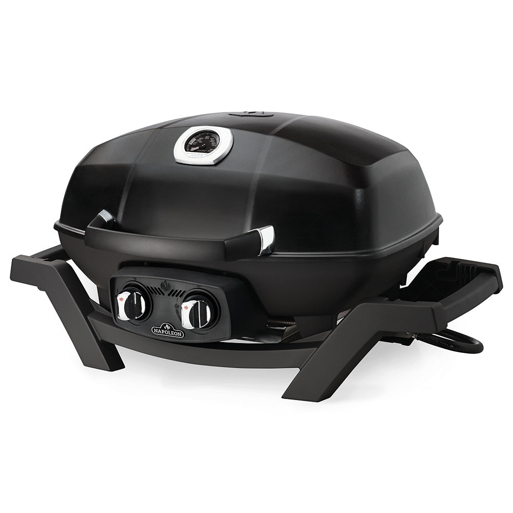 Portable tabletop gas grill with black lid and two front burner knobs, angled view.