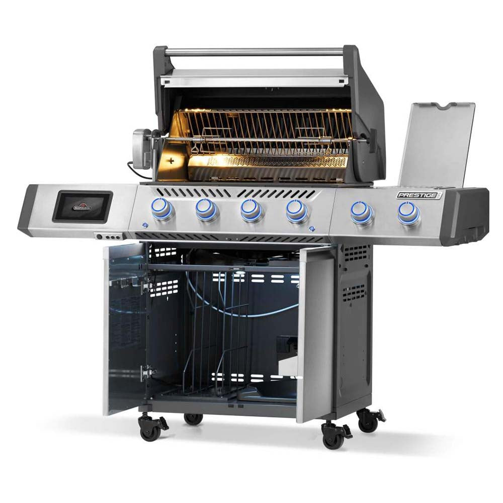Open stainless steel gas grill with warming rack and cooking grates visible