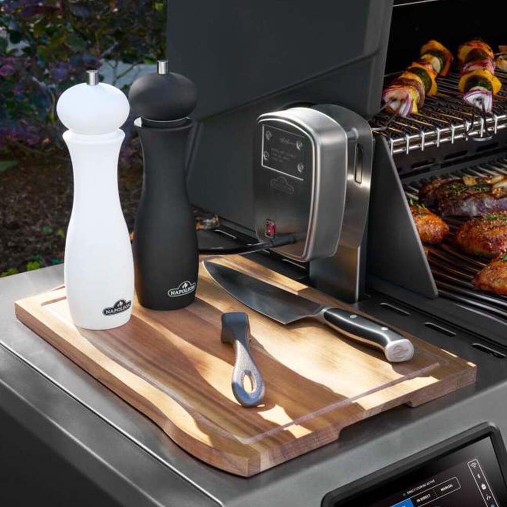 Stainless steel gas grill side shelf with salt and pepper mills and utensils