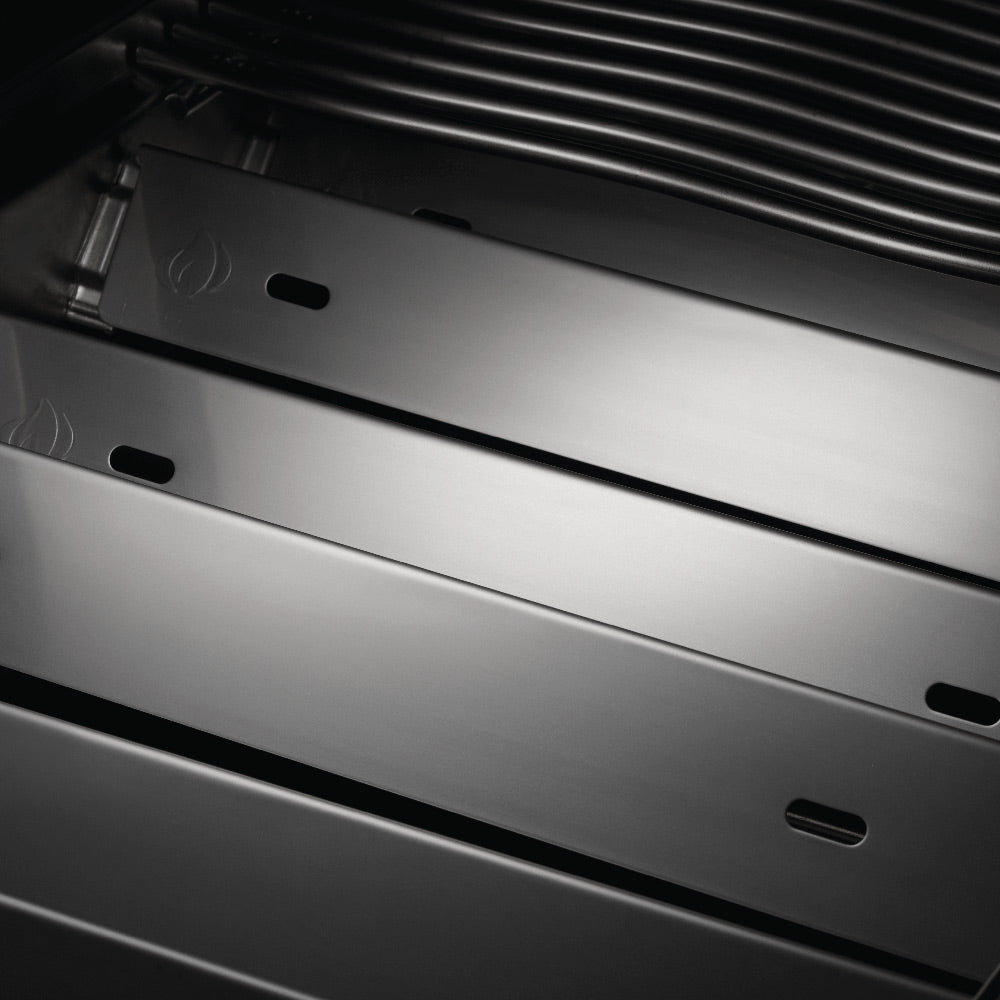 Stainless heat deflector panel with vent slots inside the gas grill