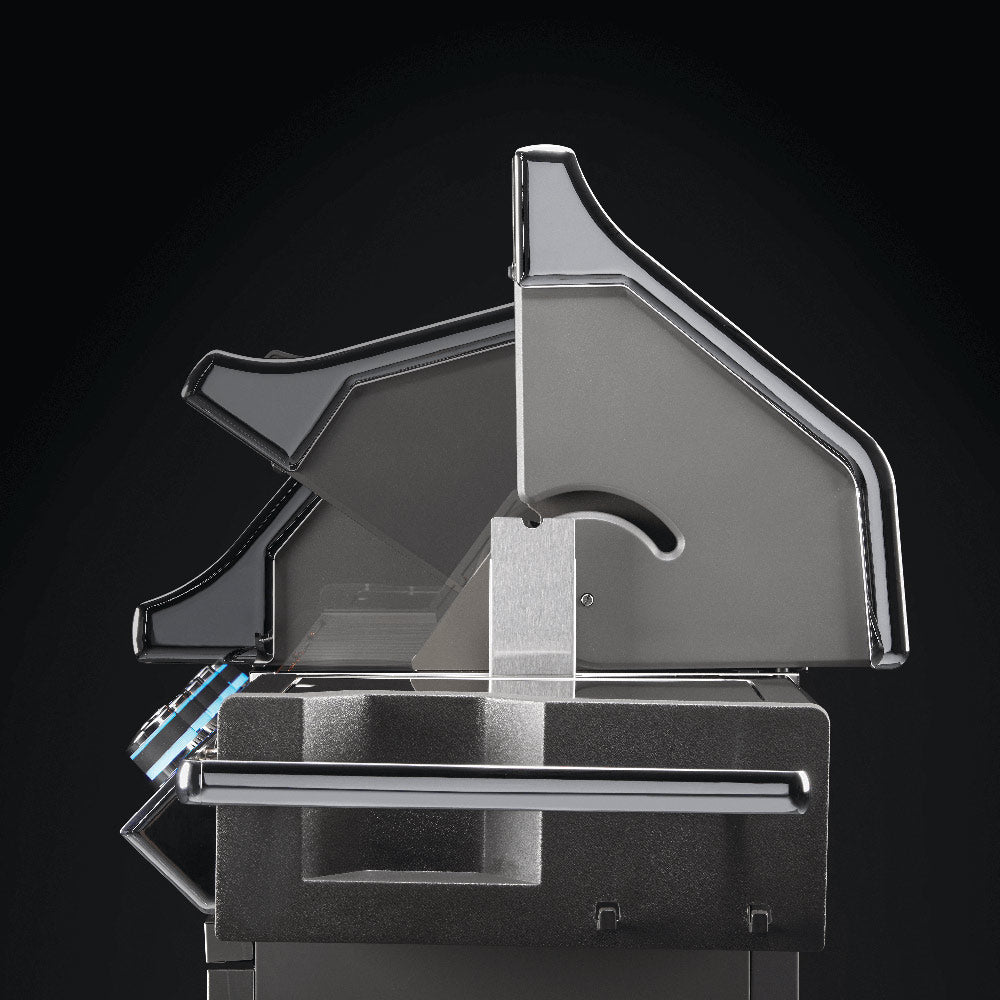 Rotisserie motor housing and support bracket mounted on a stainless grill body