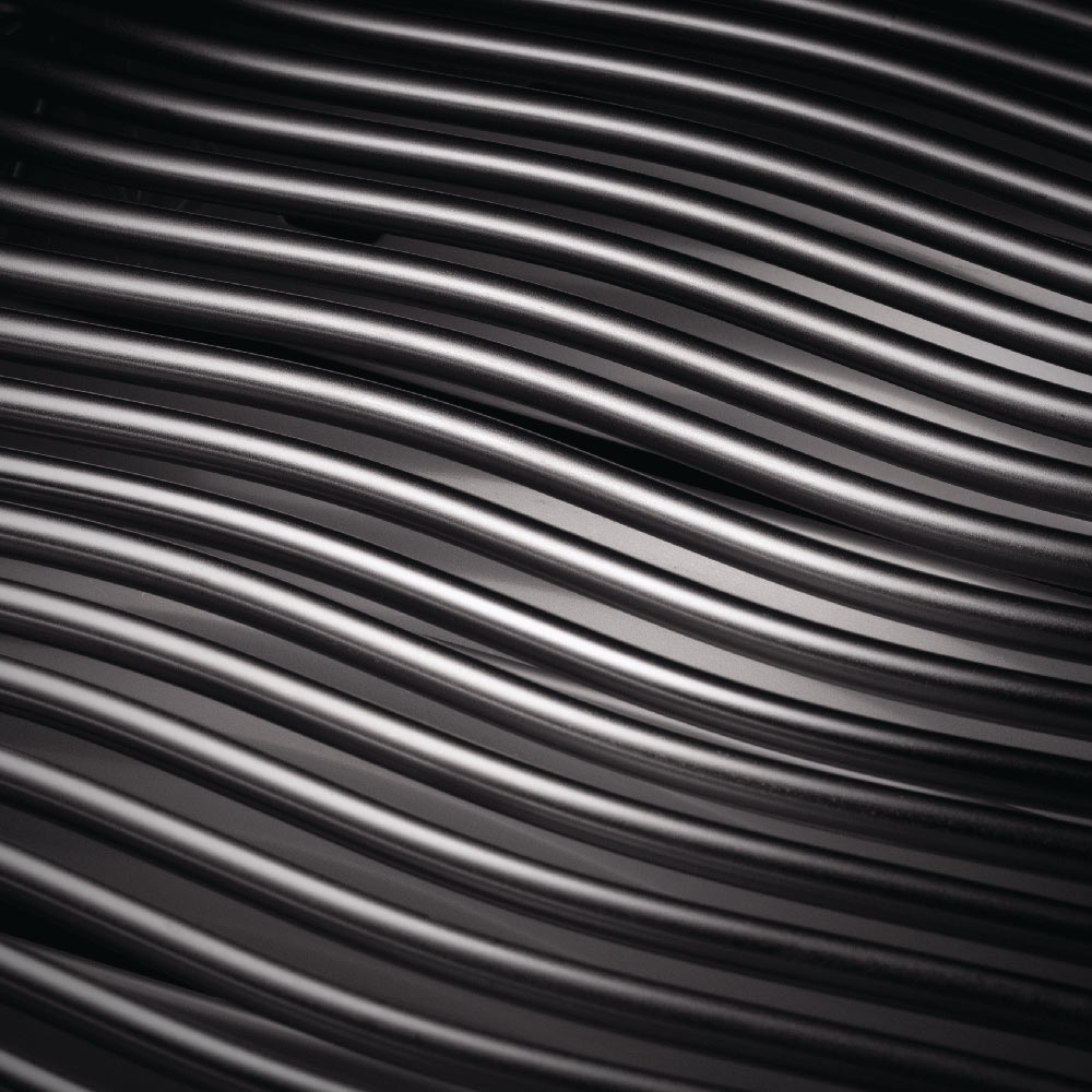 Close-up of stainless steel grill grates with parallel cooking bars