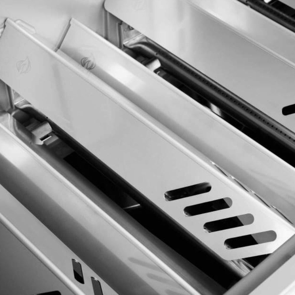 Stainless steel warming rack and internal vented tray inside the grill