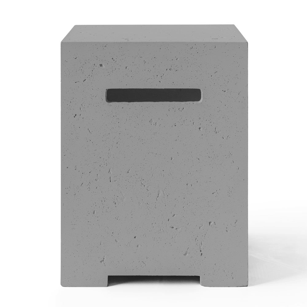 Close-up of light speckled concrete propane tank cover with dark horizontal opening in front.