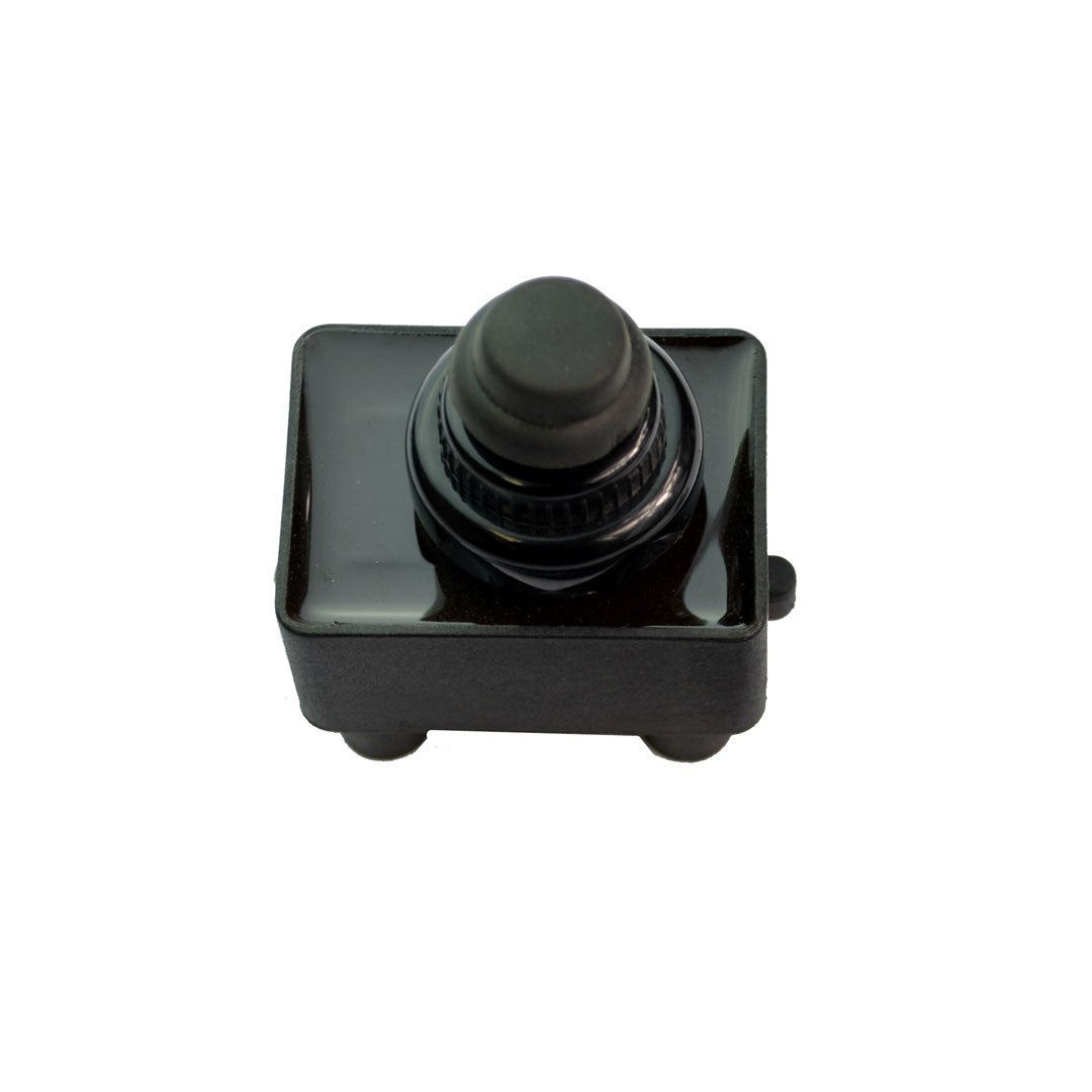 Black push-button switch with dark plastic housing