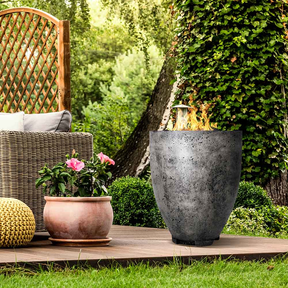 Concrete gas fire pit, round drum style, weathered gray concrete with top burner cover