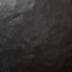 Black textured firebox liner panel with subtle mottled surface