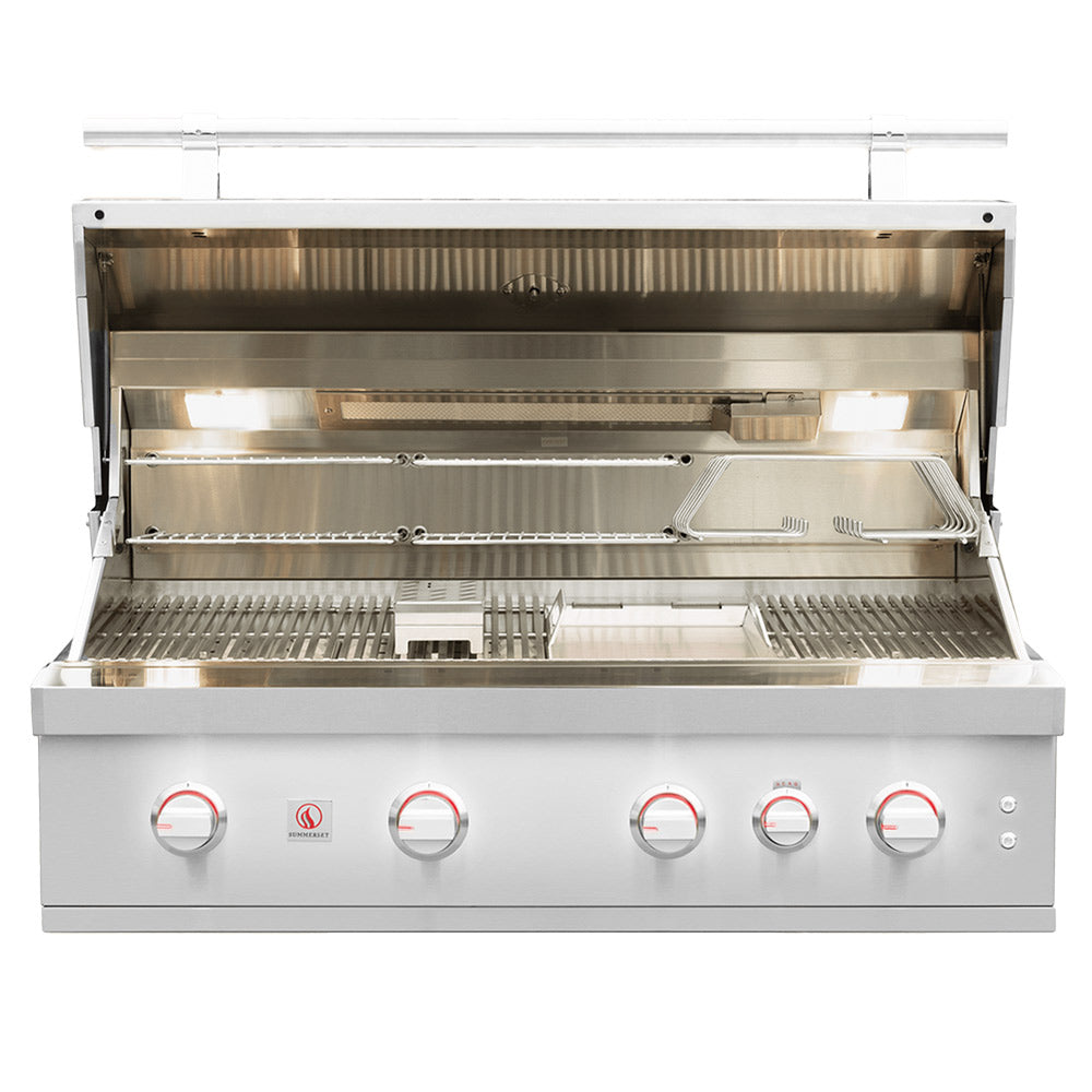 Built-in gas grill with hood open, showing burners, flavorizer bars, and cooking grates