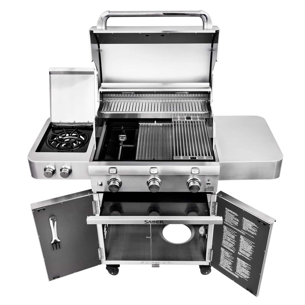Freestanding infrared grill, lid open, side burner bay and grilling grates visible