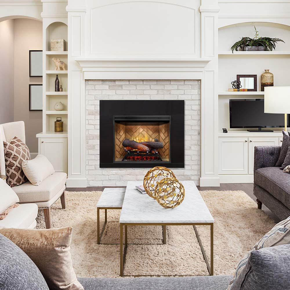 Black electric fireplace with glowing flame display set into a white brick surround