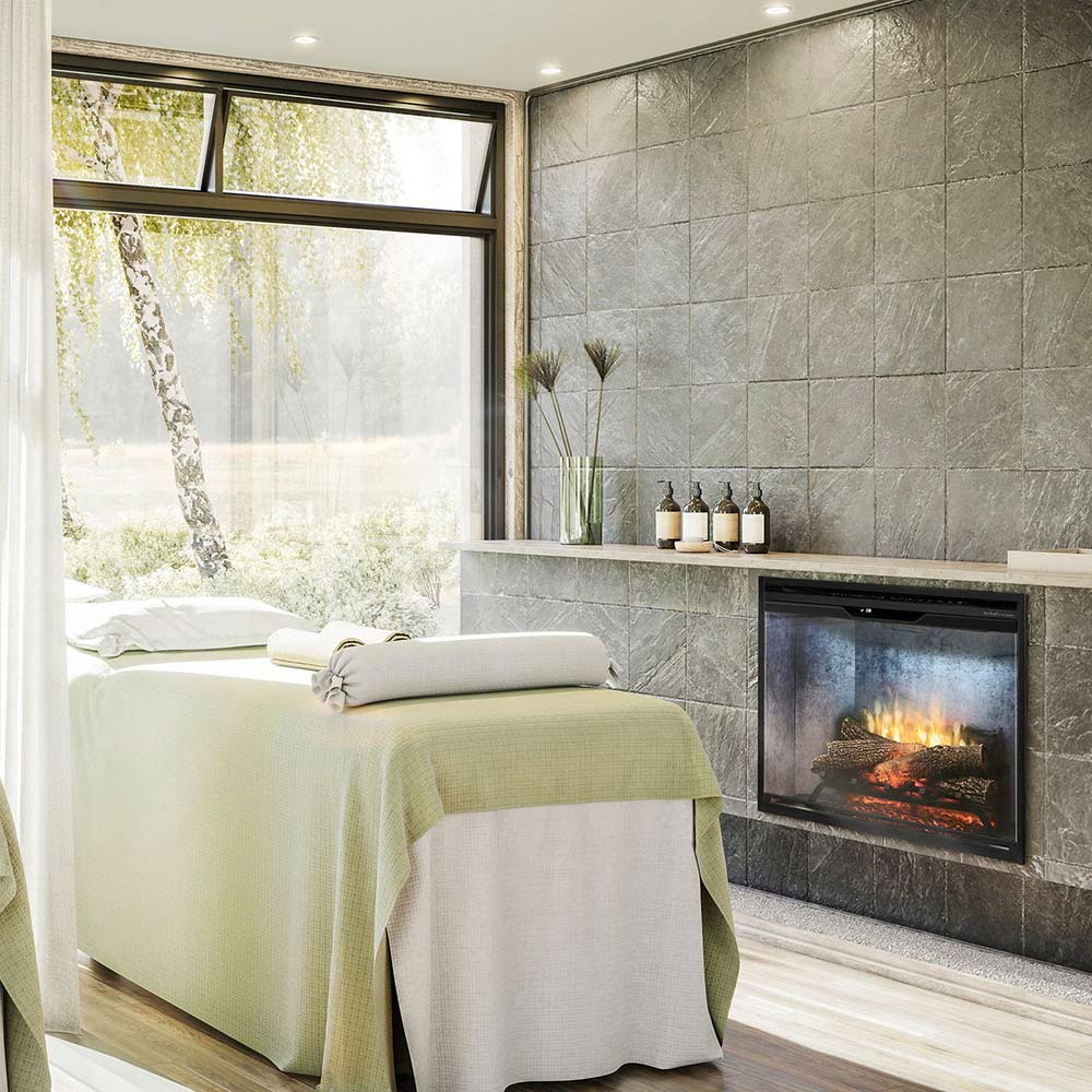 Recessed electric fireplace with glass front, glowing logs and flickering flame in living room