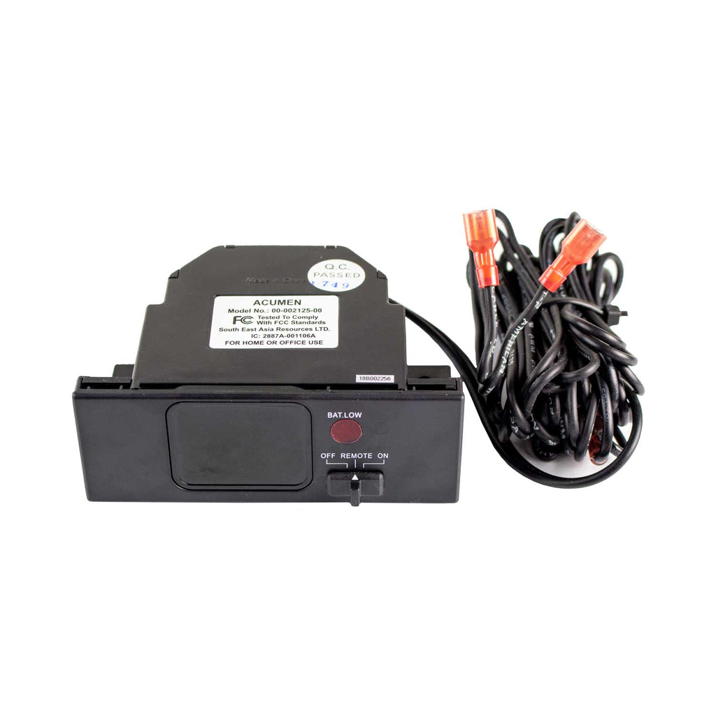 Fireplace remote receiver with wiring harness and low-battery indicator label.