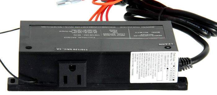 Black rectangular receiver module with power outlet and wiring terminals