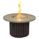 Round gas fire pit table with light wood top and dark fluted base; fire bowl with flames.
