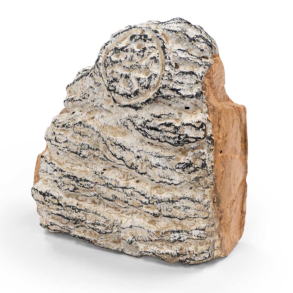 Decorative charred birch wood chunk cover with rough gray and tan texture