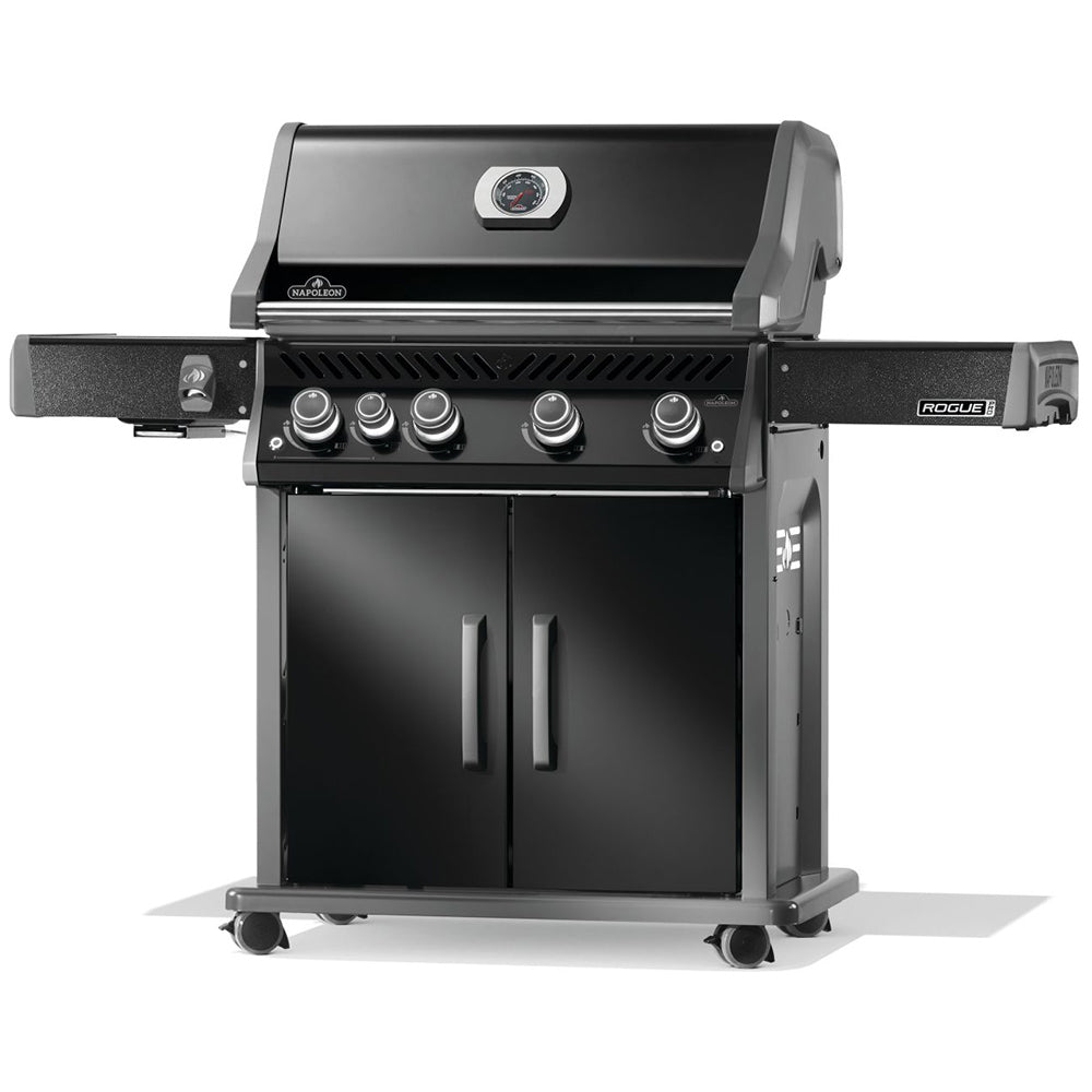 Stainless gas grill with control knobs, two cabinet doors, and side burner